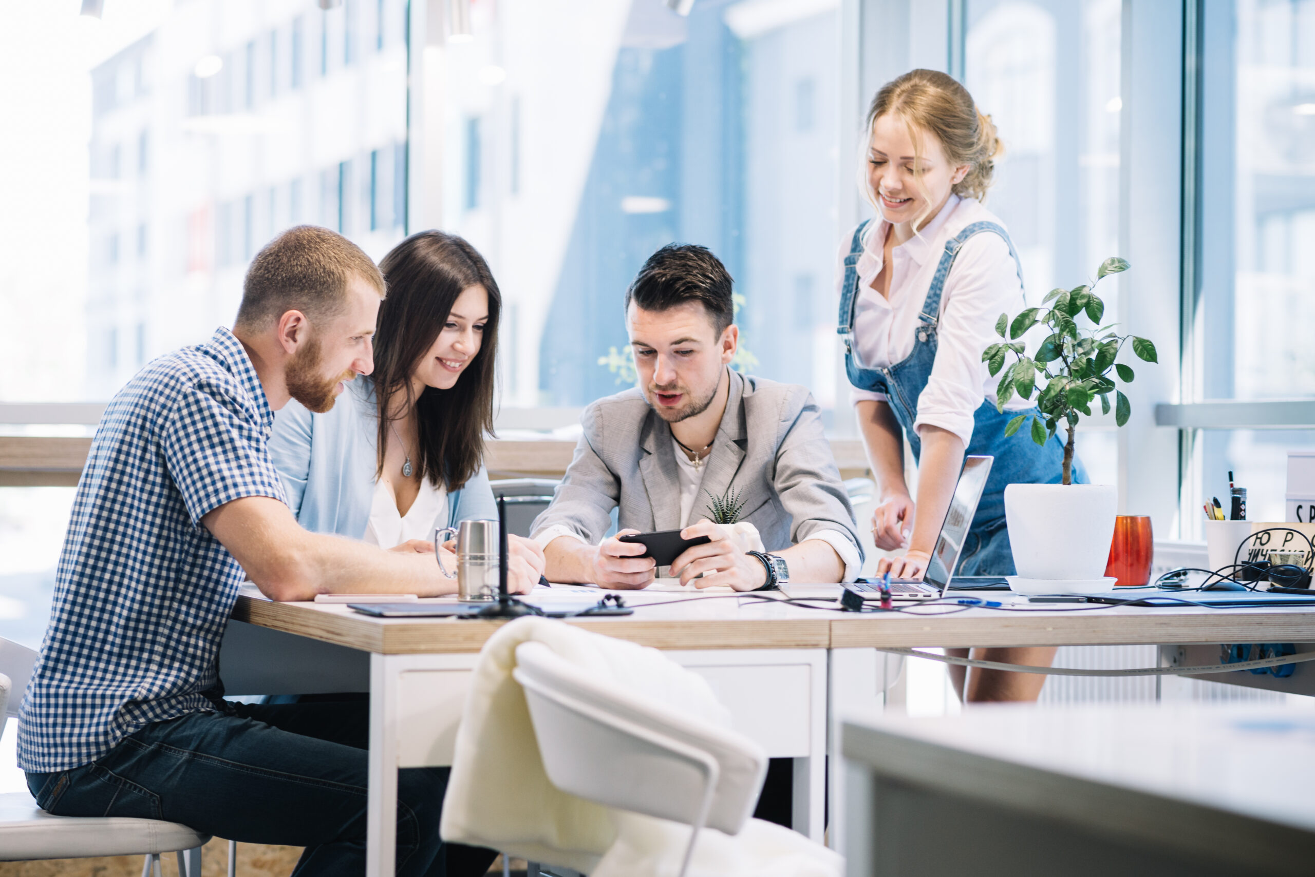 man-showing-new-strategy-colleagues